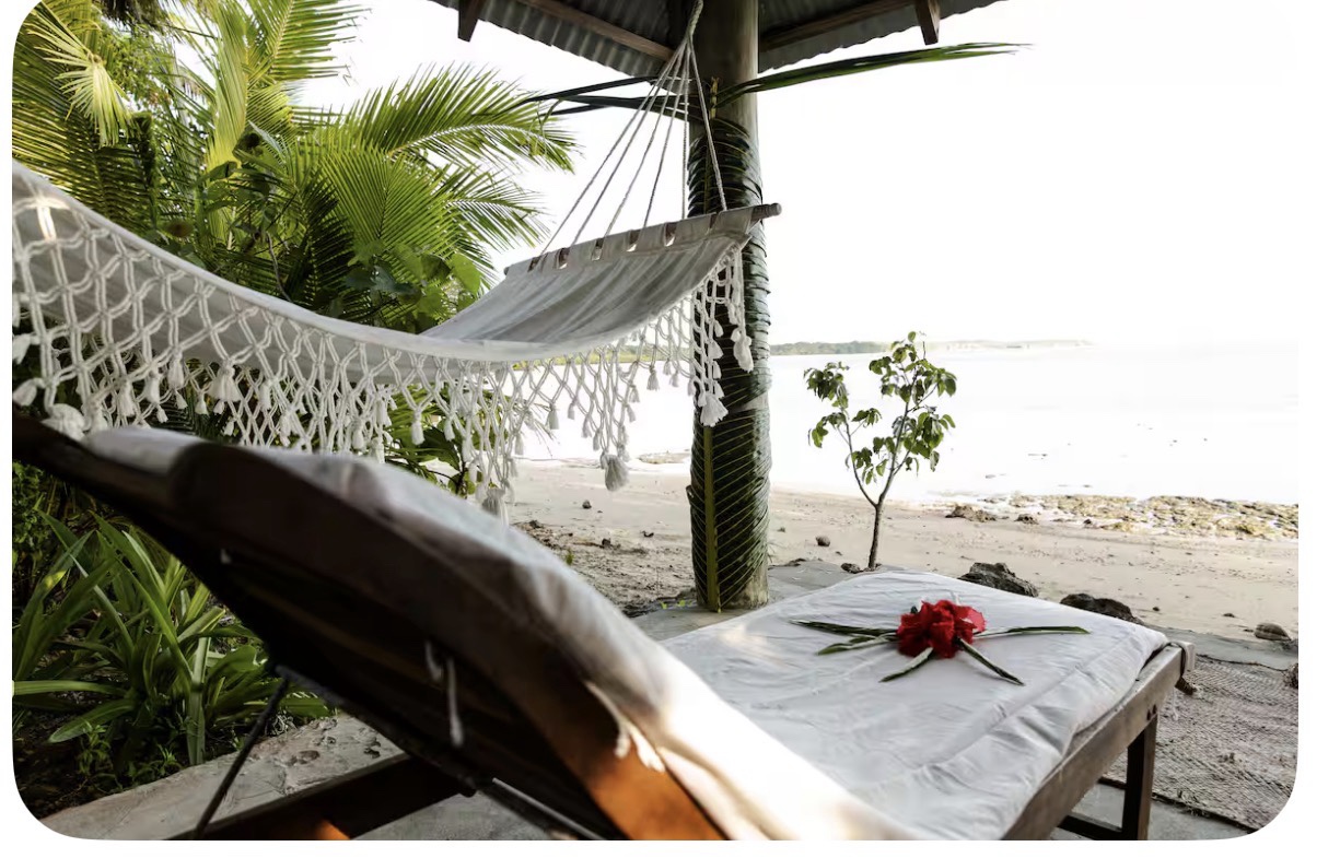 A hammock beside Namawa Estate's private beach in Savusavu
