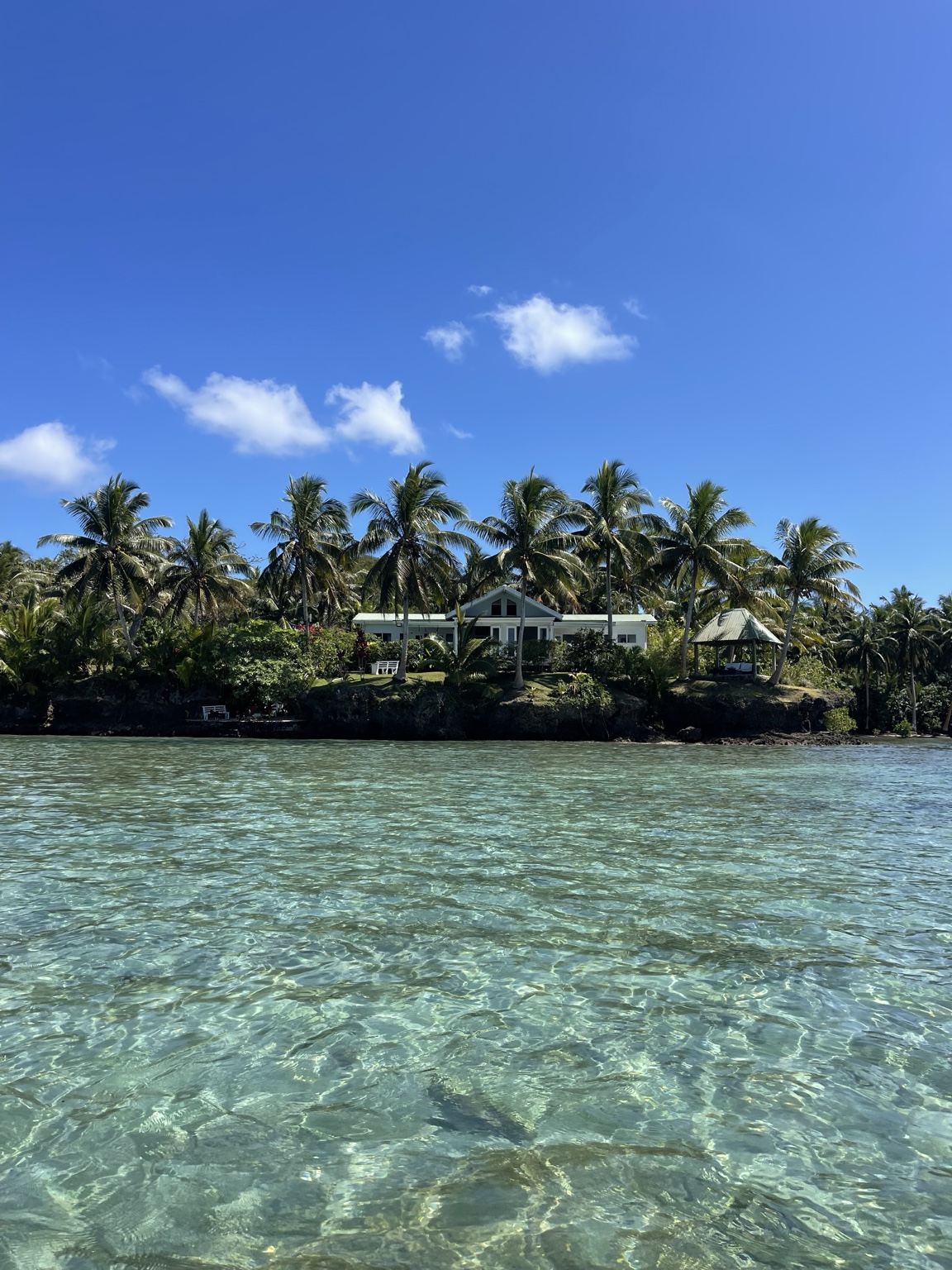 Namawa Estate and private beachfront seen from the clear waters of Savusavu, Fiji