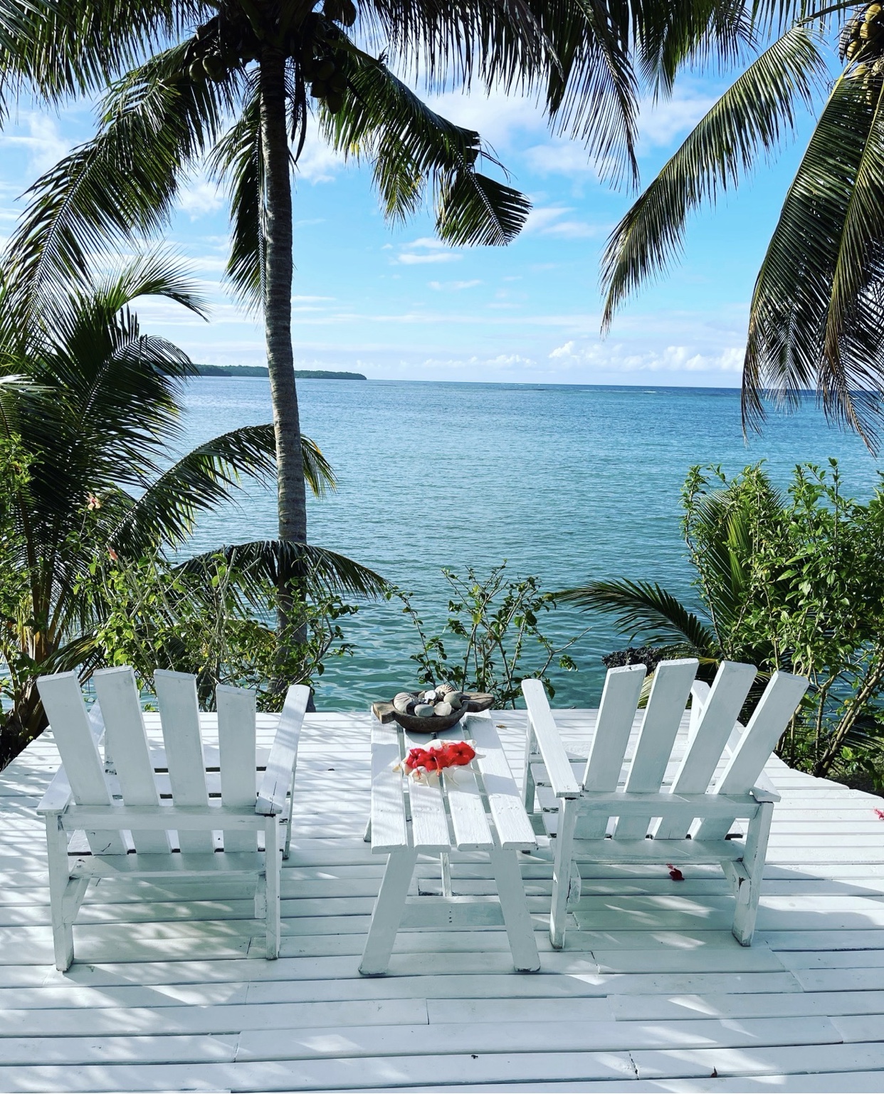 Quiet oceanfront chairs at Namawa Private Estate